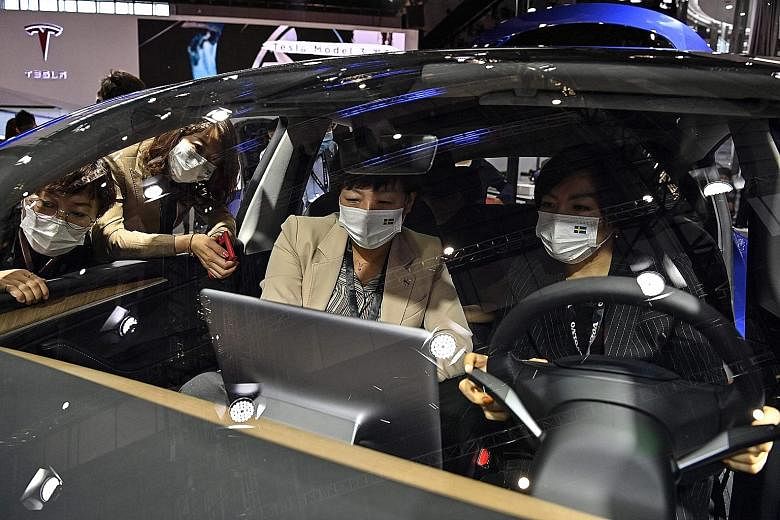 A Tesla Model Y car at the Shanghai International Automobile Industry Exhibition in April. Registrations of the China-made sport utility vehicle rose to 12,785 last month from 5,520 in April, despite a high-profile protest against Tesla at the Shangh