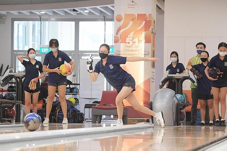 Katong Convent girls warming up during the National School Games' B Division bowling singles championship in April. The sport is one of the 12 eligible for Colours Awards as it was contested before the NSG's cancellation.