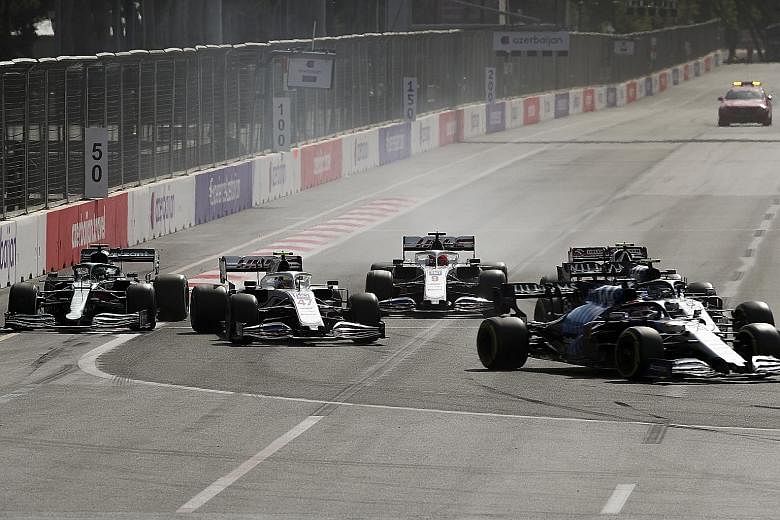 Mick Schumacher (second from left) and Haas team-mate Nikita Mazepin (third from left) in a tight squeeze during the Azerbaijan race on June 6, where they almost collided near the end.
