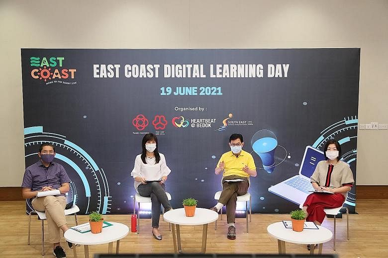 Deputy Prime Minister Heng Swee Keat (second from right) speaking at the launch of the East Coast Digital Blueprint yesterday. With him are (from left) Minister in the Prime Minister's Office Maliki Osman, and East Coast GRC MPs Jessica Tan and Chery