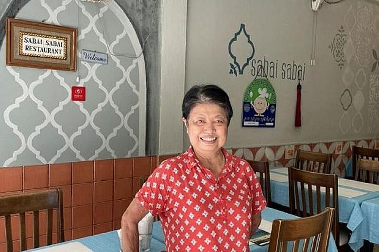 Madam Yupin Khantakul, owner of the family-run Sabai Sabai restaurant on Phuket's Patong beach, says the reopening of the island to tourists from Thursday gives hope for her business. PHOTO: PUNNISA KHANTAKUL