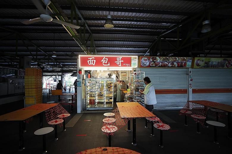 A stall selling baked goods that was open for business yesterday morning at 115 Bukit Merah View Market and Hawker Centre. Fewer than 10 out of the centre's 182 stalls were open for business when The Straits Times visited the market.