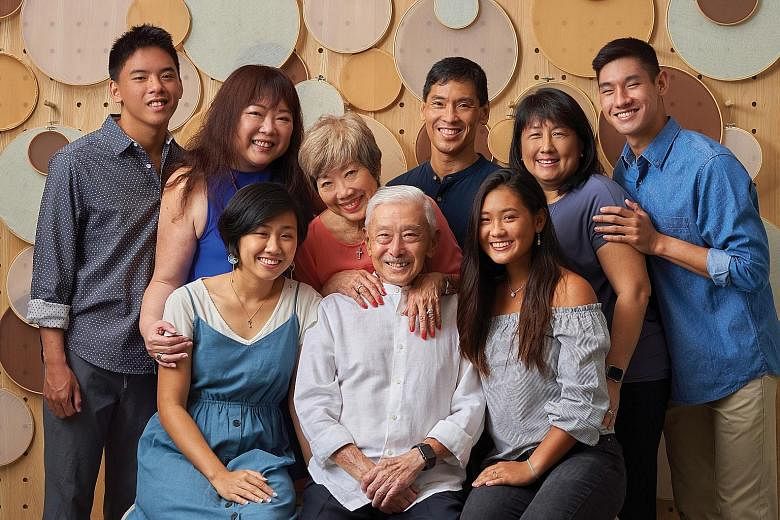 Former military chief Winston Choo (in white) in a family photo last year. Among other things, his memoir touches on his leadership philosophy, his cancer battle and the support given by his wife Kate (in red).