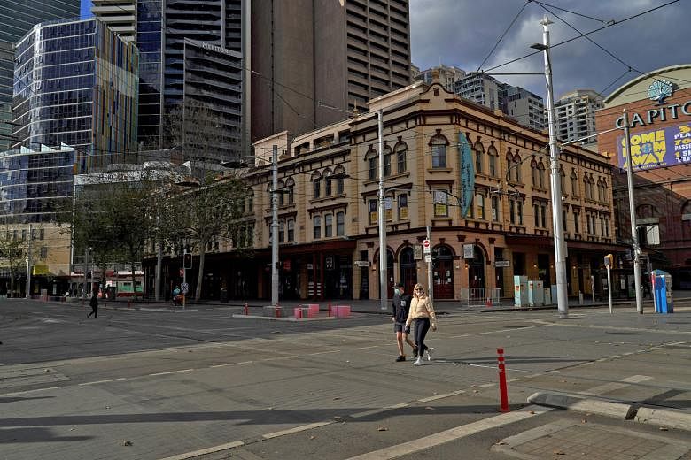 A near-deserted city centre in Sydney on Saturday, the first day of a two-week lockdown there. While vaccination drives have brought down infections in wealthy countries, the Delta strain, which first emerged in India, has fuelled fears that the pand