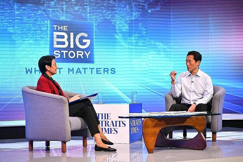 Minister for Health Ong Ye Kung with The Straits Times' senior health correspondent Salma Khalik during an exclusive interview at SPH News Centre yesterday.