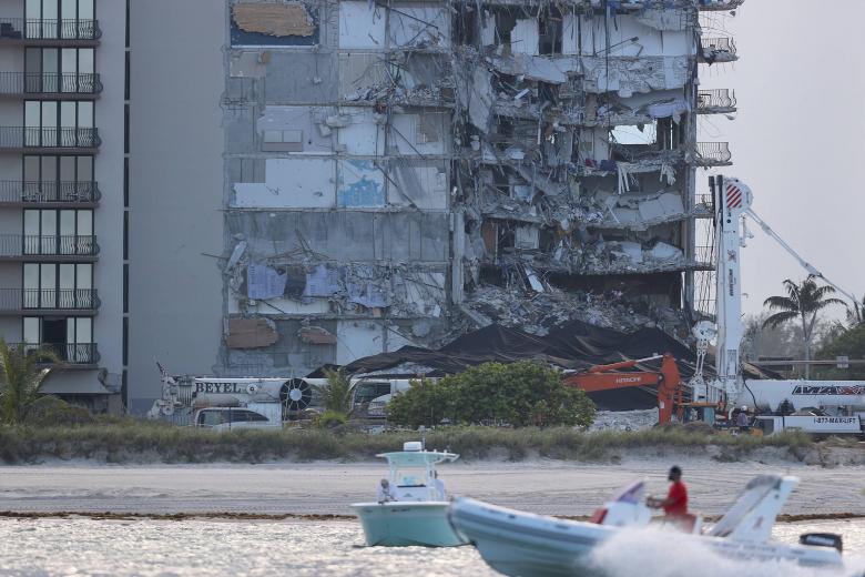 Collapsed Florida condo demolished ahead of storm, search to resume ...
