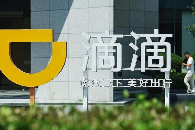 Companies involved in the latest crackdown include subsidiaries of tech behemoths Alibaba and Tencent, as well as ride-hailing platform Didi (above). According to documents, the firms had either formed joint ventures without prior authorisation, or a