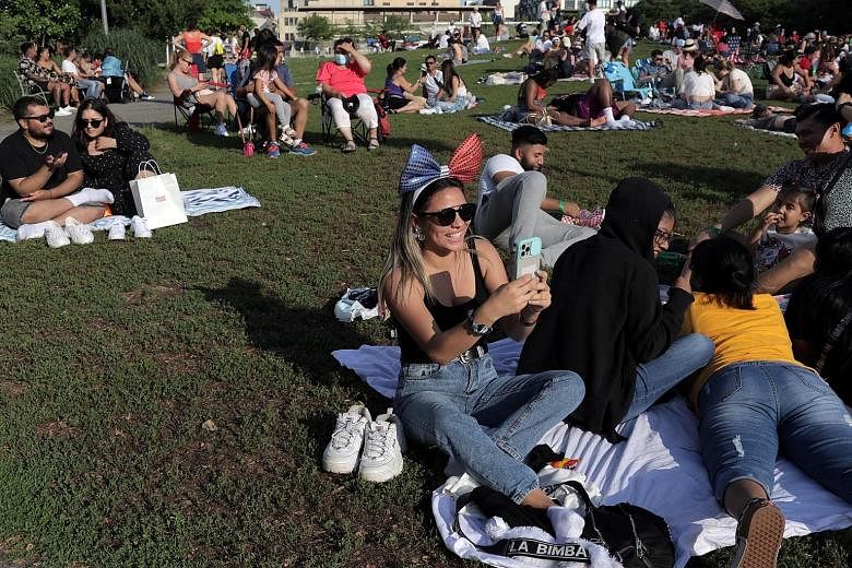 Crowds enjoying the sun at Bushwick Inlet Park in Brooklyn, in the United States, on Sunday. As wealthy nations progressively leave the pandemic behind, plodding steadily towards herd immunity, anger will grow as poorer states suffer under prolonged 
