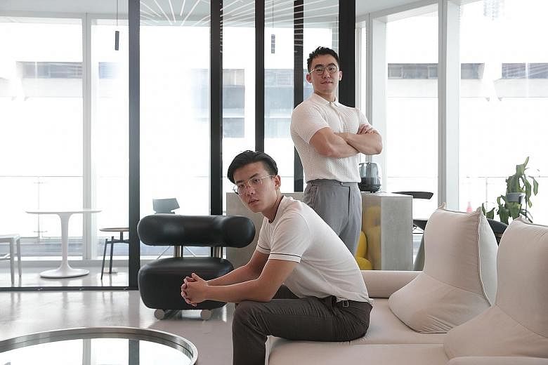 Reshape Space co-founders Dong Haoran (seated), 18, and Zhao Hongwei, 28, are confident that their hybrid gym-cum-tuition business can do well. ST PHOTO: TIMOTHY DAVID Above: Fitness trainer Huang Yingrui, 30, with a client at Reshape Space's gym. Be
