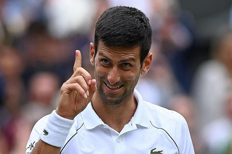 A happy Novak Djokovic after winning Wimbledon on Sunday for a record-tying 20th Grand Slam title. He will be just the third man to complete the calendar Grand Slam if he wins the US Open in September.