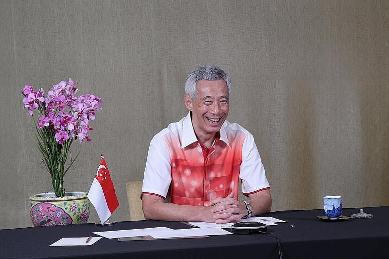 Prime Minister Lee Hsien Loong having a virtual chat with Singapore's national athletes who will be competing at the upcoming Tokyo 2020 Olympic and Paralympic Games. PHOTO: LEE HSIEN LOONG/FACEBOOK
