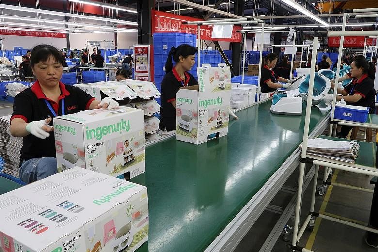 The production line of American infant product and toy manufacturer Kids II at a factory in Jiangxi province, China, last month. Global appetite for Chinese goods spurred exports this year, along with rising prices.