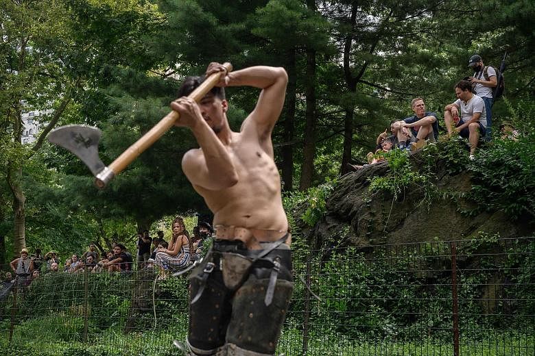Over last weekend, a corner of New York's Central Park became an impromptu battlefield (top), as members of the Gladiators NYC armoured-combat group took on one another in full mediaeval armour (left and above), in a demonstration of brute strength (