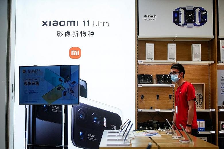Xiaomi has roughly equal share of the China market with rivals Oppo and Vivo, but overseas expansion was the biggest driver of its growth. PHOTO: REUTERS