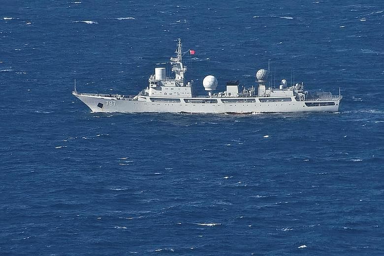 A second vessel is set to join a larger Chinese auxiliary general intelligence ship (right), seen here travelling through the Arafura Sea on July 11, and is being monitored by Australia's defence force.