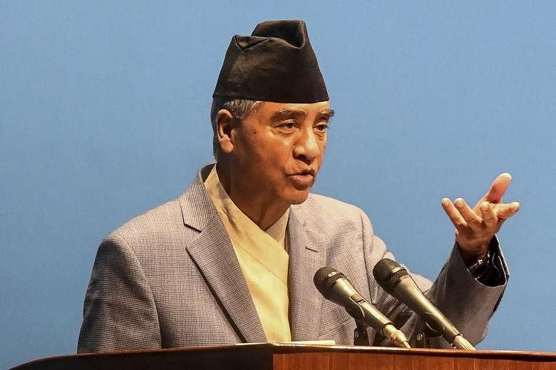 Nepal's new prime minister wins crucial vote of confidence The