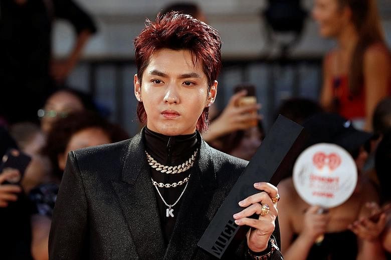 Pop idol Kris Wu (above left, in a 2018 photograph) has been accused by student Du Meizhu (right) of date rape.