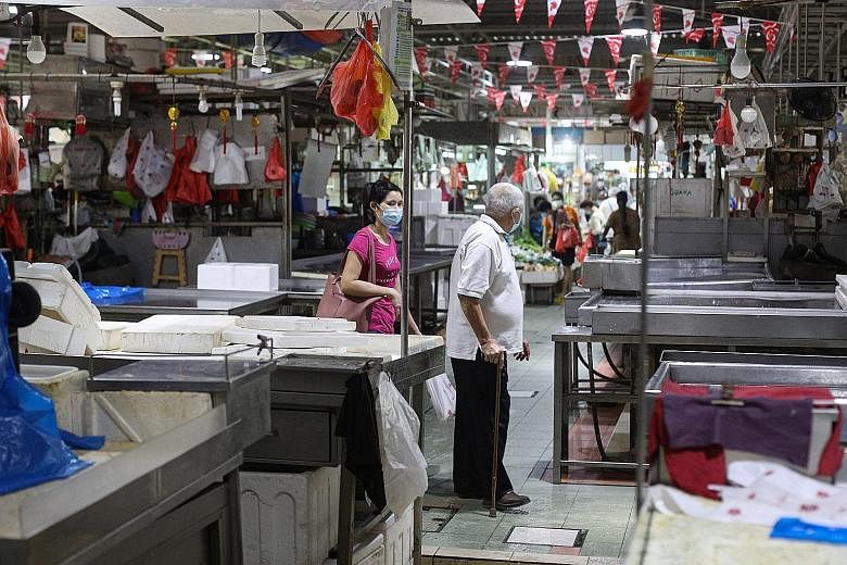 Closed seafood stalls on Sunday at Jurong West 505 Market, one of the markets linked to the Jurong Fishery Port cluster. The fishery port cluster had 130 new Covid-19 cases linked to it yesterday, bringing its total number of cases to 454.
