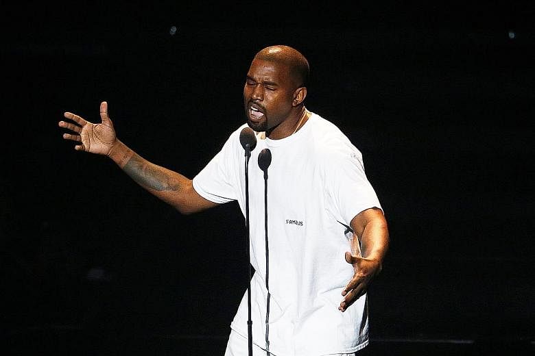 Rapper Kanye West dropped hints about his new music in an advertisement during the NBA Finals.