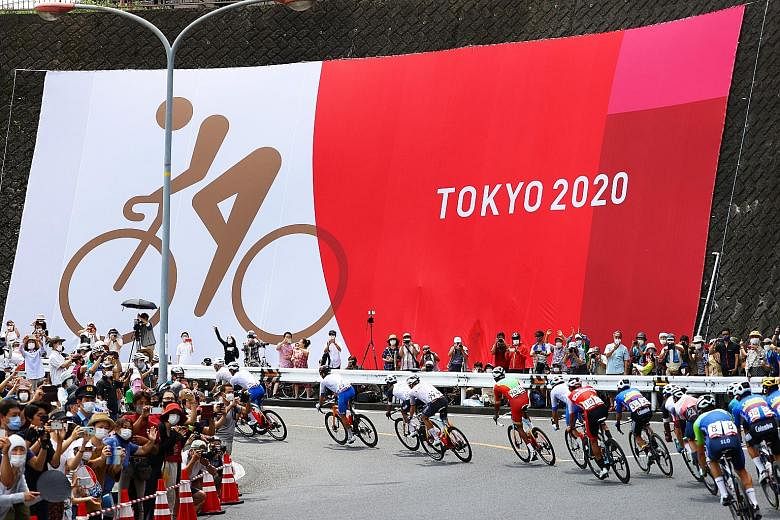 After Friday's opening ceremony at the Olympic Stadium devoid of fans, it was a welcome sight to see Japanese spectators line the course around Mount Fuji yesterday.