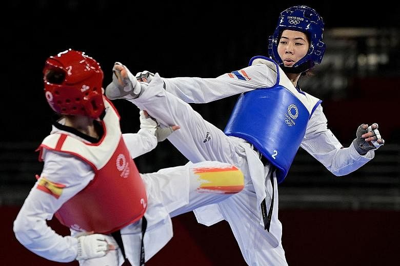 Panipak Wongpattanakit earns Thailand its first gold in taekwondo following her victory over Spain's Adriana Cerezo Iglesias in the women's 49kg final bout at the Tokyo Games yesterday.