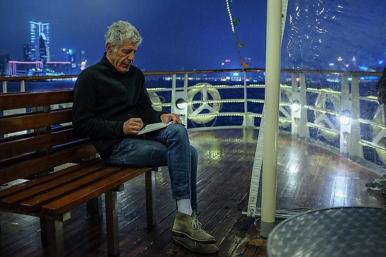 Anthony Bourdain on the Star Ferry in Hong Kong in 2018 during the shooting of his television series. The new documentary uses several hours of his voice recordings to create 45 seconds of new audio.