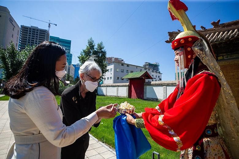 US Deputy Secretary of State Wendy Sherman (centre) visiting the Choijin Lama Temple Museum in Ulaanbaatar, Mongolia, on Saturday, as part of her Asian trip. She was scheduled to arrive in China yesterday.