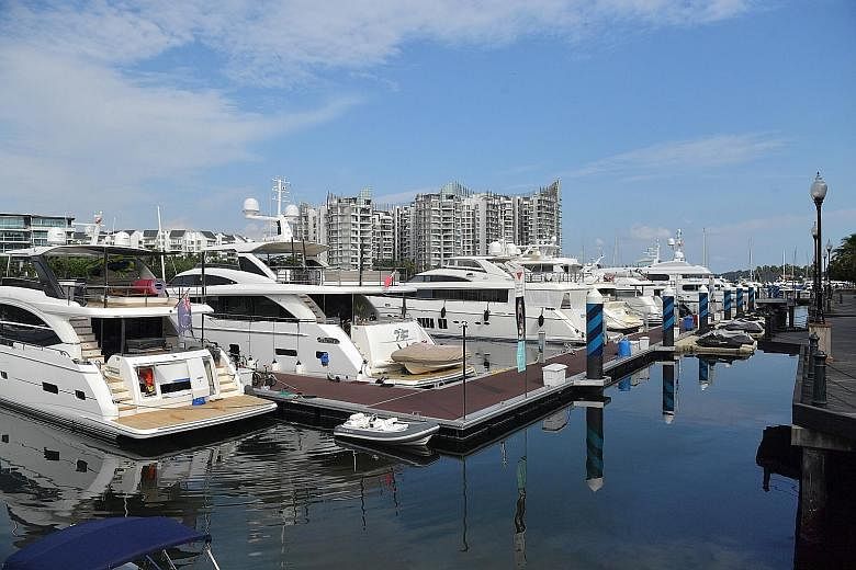 Yachts and boats at the ONE°15 Marina Sentosa Cove. It is important to plan your budget carefully before commiting to buy a yacht.