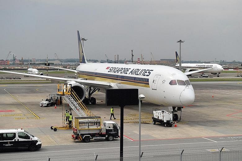 Singapore Airlines jets at Changi Airport. The company said its strong balance sheet and access to liquidity enabled it to position itself for growth as the aviation sector recovers from the impact of the pandemic.