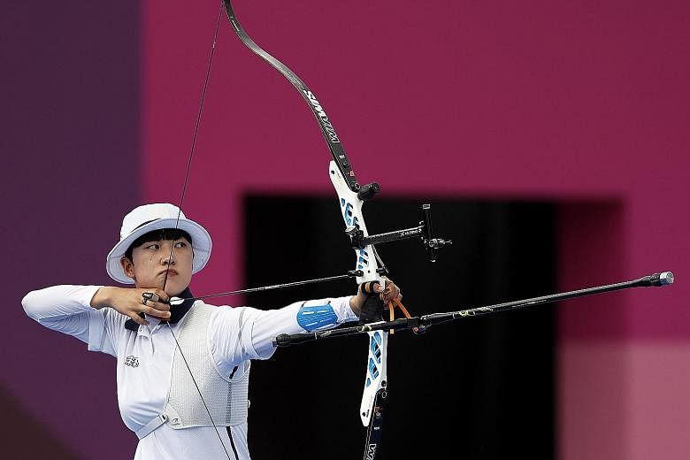 South Korea's An San en route to her individual gold in archery. She is the first athlete from her country to win three gold medals at a single Games.