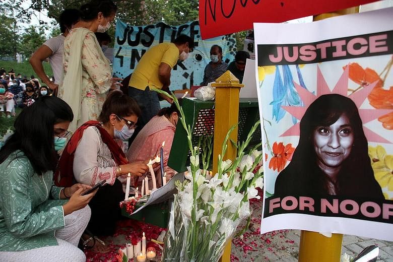 People at a vigil in Pakistan's capital Islamabad for Ms Noor Mukadam, who was murdered on July 20. Police have charged Zahir Jaffer, a US national and scion of one of Pakistan's wealthiest families, with murder.