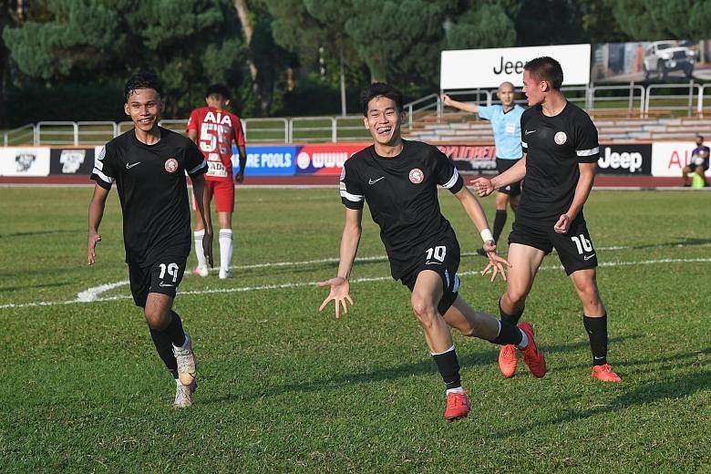 Khairin Nadim Rahim (left), Daniel Goh and Ryhan Stewart celebrate after Goh scores for Young Lions in their 3-2 win over Balestier Khalsa at the Toa Payoh Stadium yesterday. Goh slotted the ball in against his former club, after the Tigers failed to