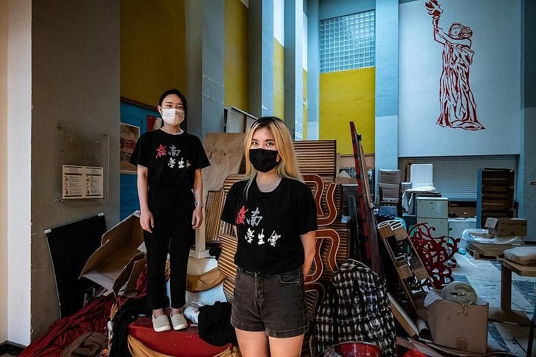 Ms Kitty Law (far left), a first-year member of the student union at Lingnan University, and Ms Yanny Chan, a leader of the union, do not want the group to disappear, but are wondering how much longer it will exist as the authorities clamp down on st