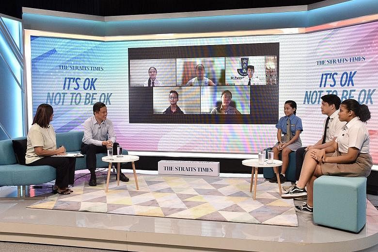 Education Minister Chan Chun Sing, with Straits Times senior education correspondent Sandra Davie as moderator, at Friday's mental well-being dialogue with junior college and secondary school students. During the session, the students also described 