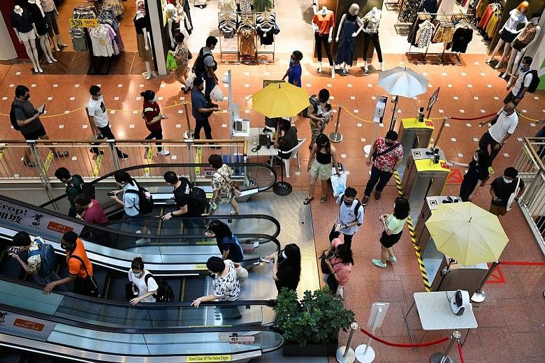 People at Jurong Point shopping mall last week. According to one expert, while it is possible that new variants with even better transmissibility may appear, "Delta is already a very fit strain and has thus far out-competed all other variants to rema