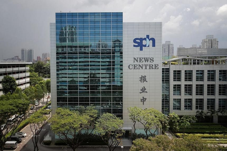 Singapore Press Holdings chief executive Ng Yat Chung (below, right) and chief financial officer Chua Hwee Song (below, left) during a virtual press conference held at SPH News Centre yesterday. Mr Chua said Keppel's offer was selected after evaluati