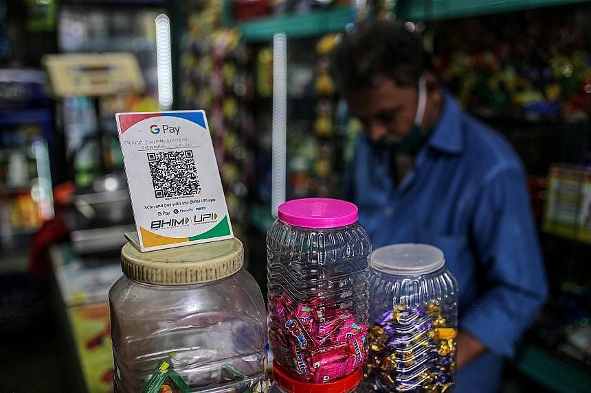 A general store in Mumbai, India, advertising the use of the Google Pay digital payment system. QR codes may be new to many American shoppers, but they have been popular internationally for years. A giant mural by artist Heman Chong titled Safe Entry