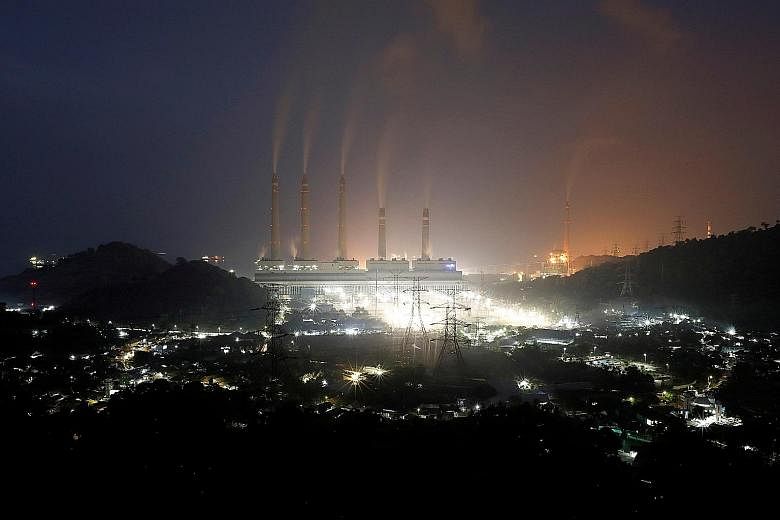 A coal-fired power plant in Suralaya in Indonesia's Banten province. The novel plan to speed up closure of such plants - driven by the Asian Development Bank and involving firms including Prudential, Citi and HSBC - offers a potentially workable mode