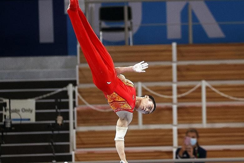 Zou Jingyuan won gold in parallel bars - his second medal after the bronze in the men's team event last week.