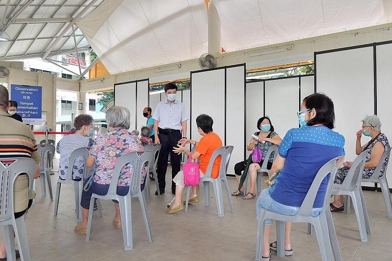 Seniors under observation at a vaccination centre after getting their vaccine shots late last month. Vaccination can be a matter of life and death for seniors, says the writer. People who regularly interact with an unvaccinated senior must continue t