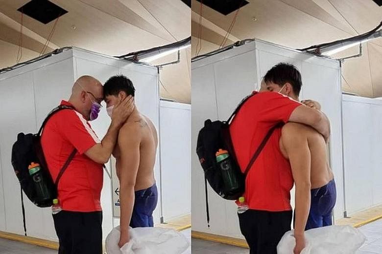 Swimmer Joseph Schooling with his coach Sergio Lopez after his 100m butterfly race at Tokyo 2020. Schooling was among the 15 athletes who attended a virtual meeting with President Halimah Yacob.
