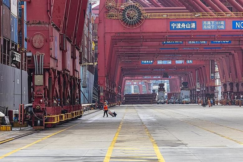 The Ningbo-Zhoushan port in Ningbo, China's Zhejiang province, in June. The port said in a statement late on Thursday that all other terminals aside from Meishan have been operating normally. When contacted yesterday, a port spokesman said there were