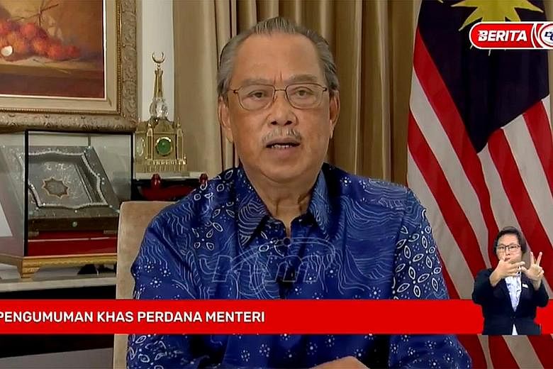 Malaysian Prime Minister Muhyiddin Yassin addressing the nation yesterday. Tan Sri Muhyiddin promised to hold a general election by end-July next year, and said the opposition leader will be given all perks akin to a senior minister's rank. The Pakat