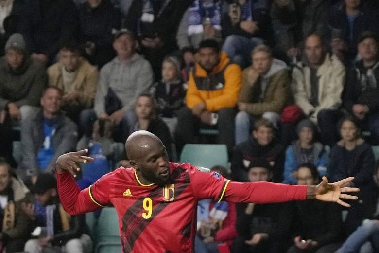 Voetbal: Lukaku verdubbelt terwijl België herstelt van een schokkende start om Estland te verslaan in WK-kwalificaties