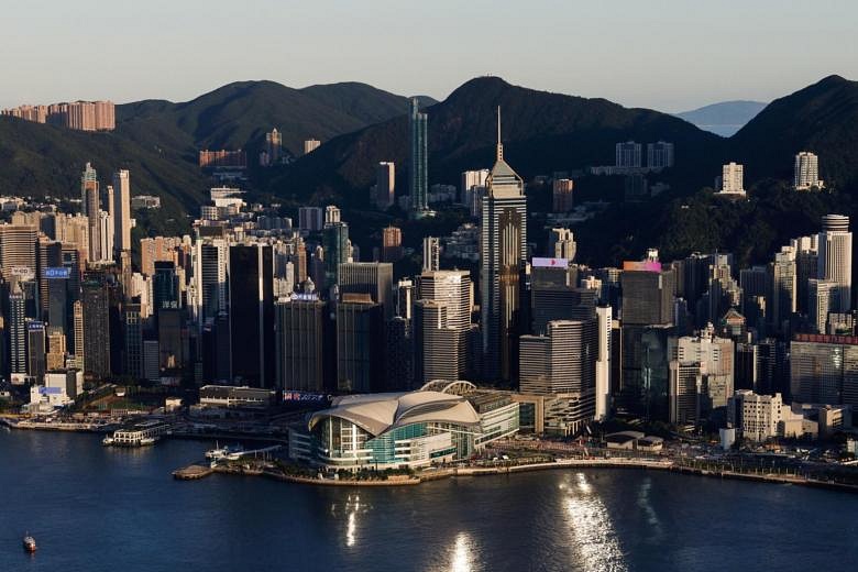 With tighter grip, Beijing sends message to Hong Kong tycoons