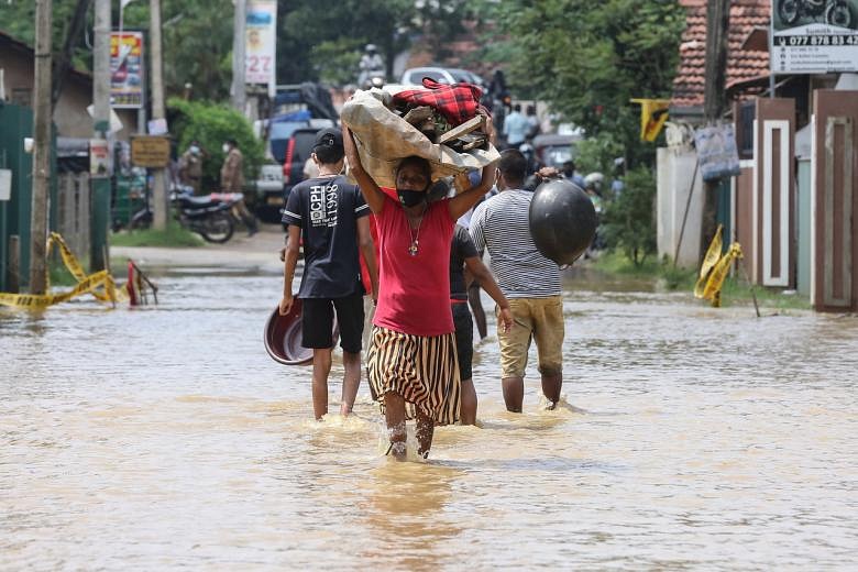 Heavy Rains In Sri Lanka, South India Kill At Least 25 | The Straits Times