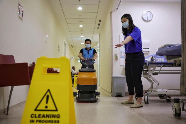 Supervisors don PPE to help tackle surge in cleaning jobs in Singapore