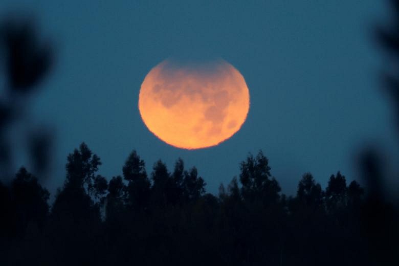 Moon turns red in longest partial lunar eclipse since 1440 | The ...