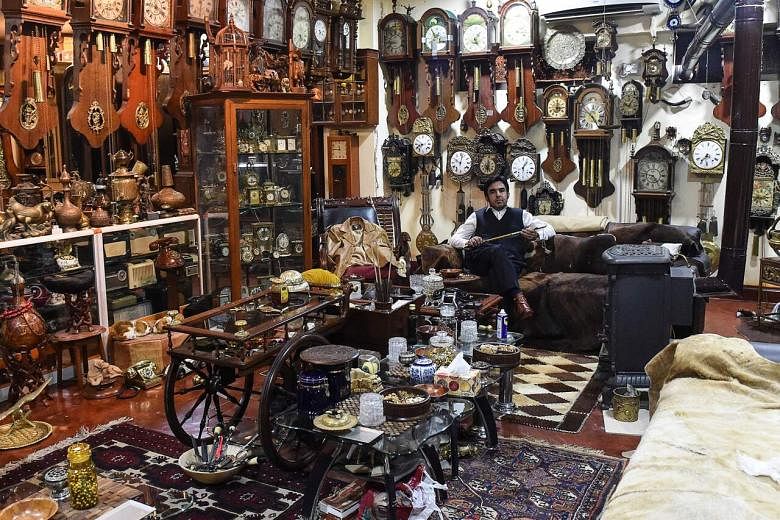 Hundreds of antique clocks fill Pakistan collector's hall | The Straits ...