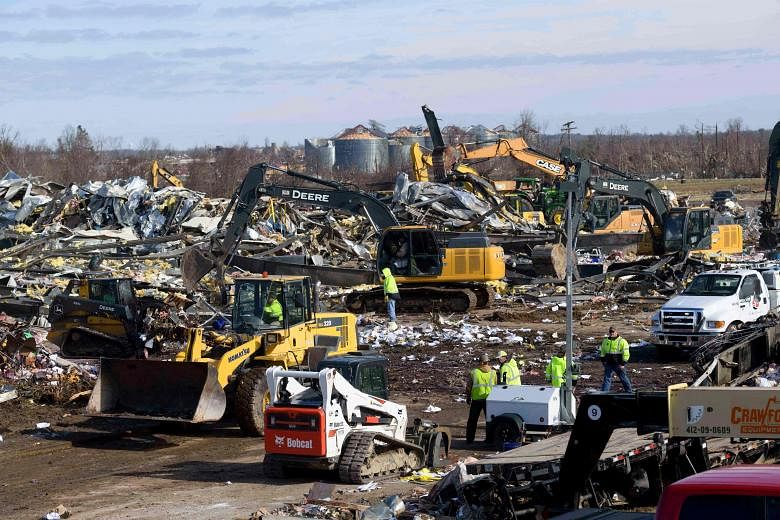 In an instant, Kentucky factory gone as tornadoes in US wreak havoc